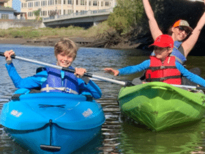 A family enjoying a kayak rental on the Napa River