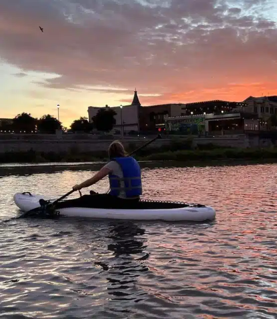 A woman renting a paddleboard, napa valley paddle board, sup